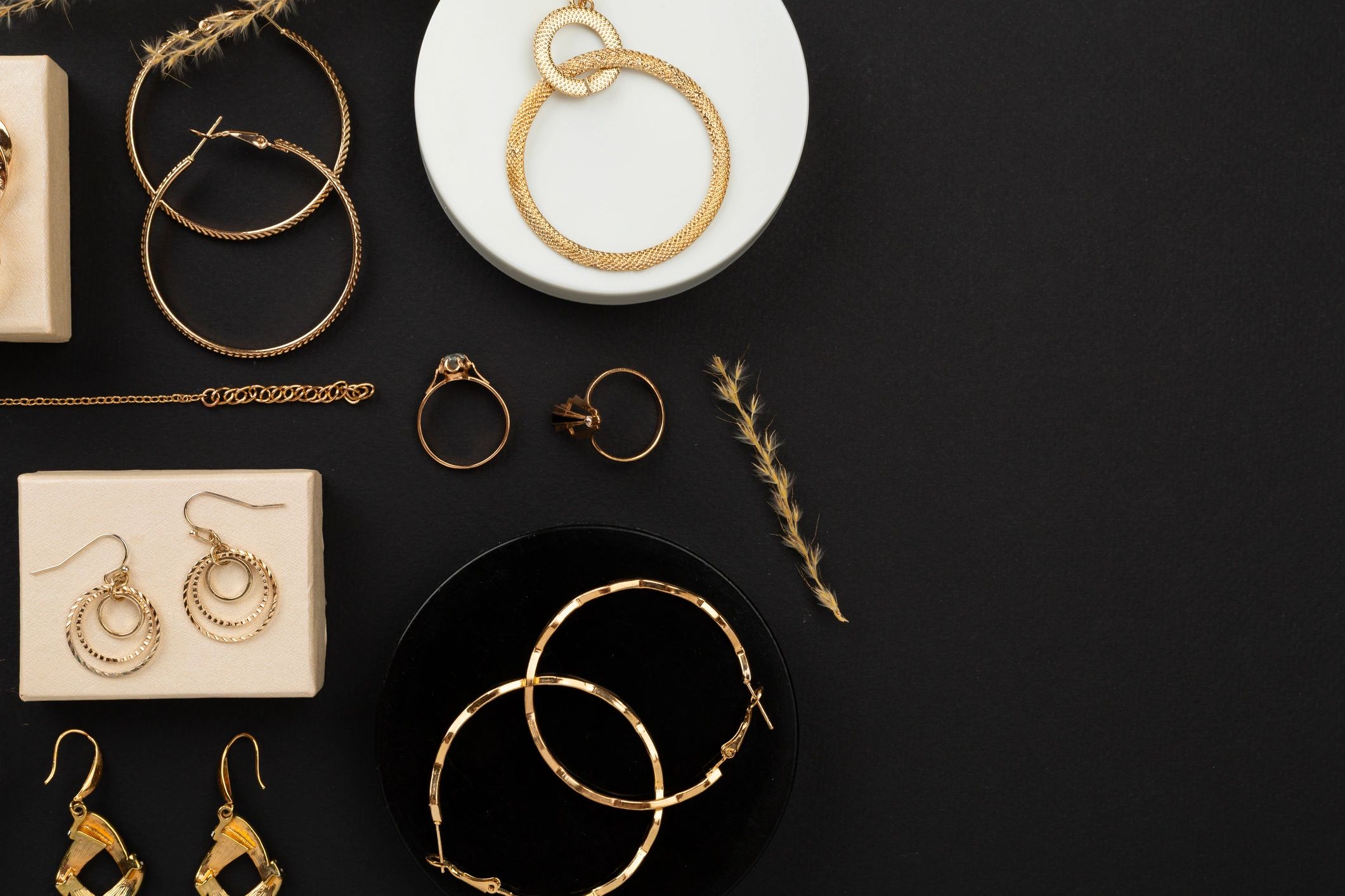 Gold jewelry flat lay representing premium accessories